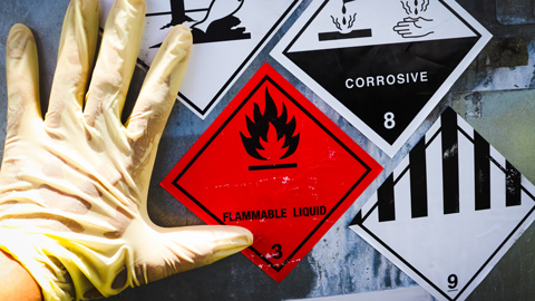warning symbol for chemical hazard on chemical container
